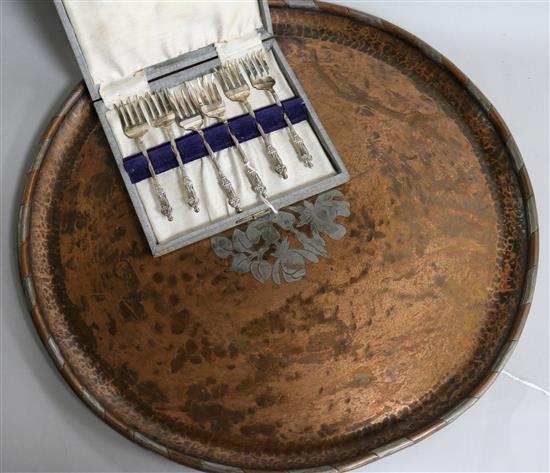 A set of six silver sardine forks with apostle terminals (cased) and an Arts and Crafts copper and plated tray by Hugh Wallace